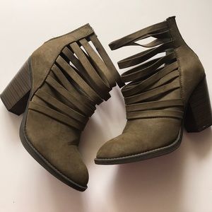 Olive green booties. Zipper on back. Size 8.5